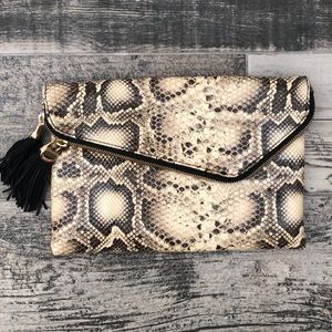 Python print leather fold over asymmetric clutch